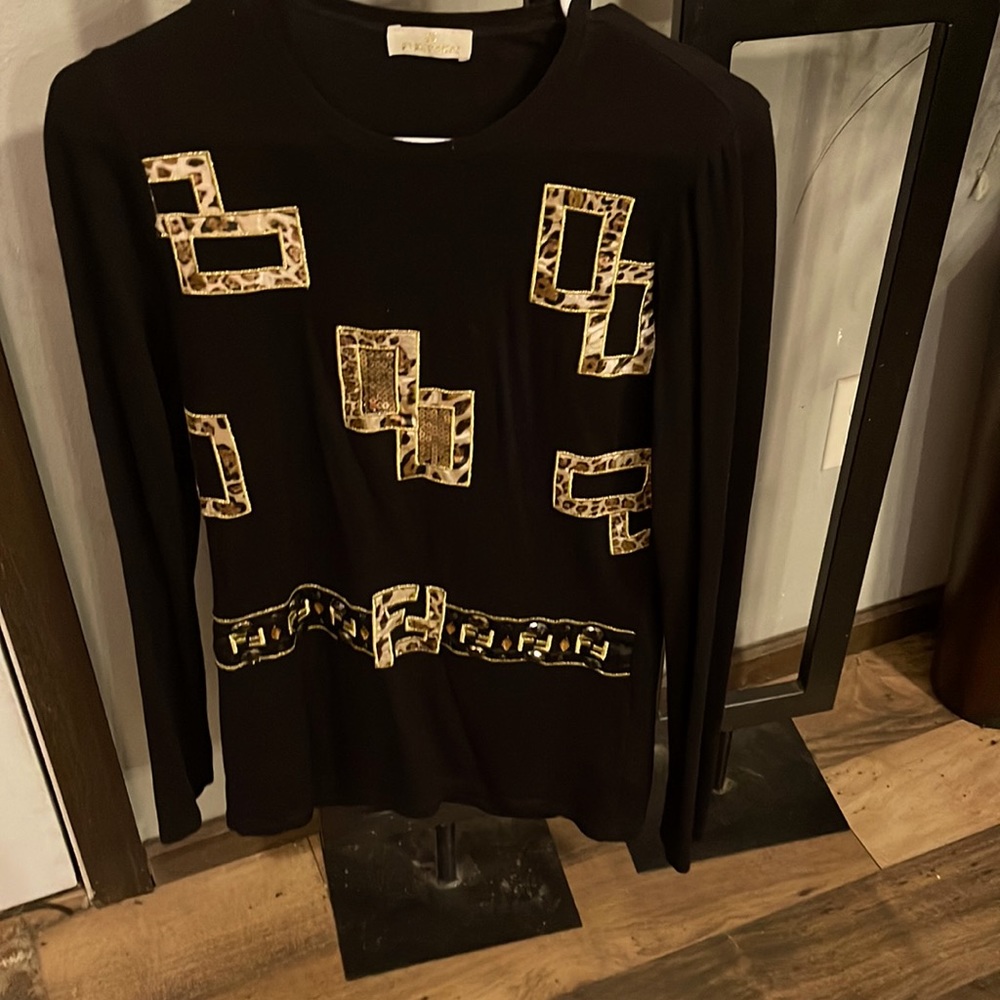 Beautiful Fendi sweater in pristine condition. Looks good casual or dressy